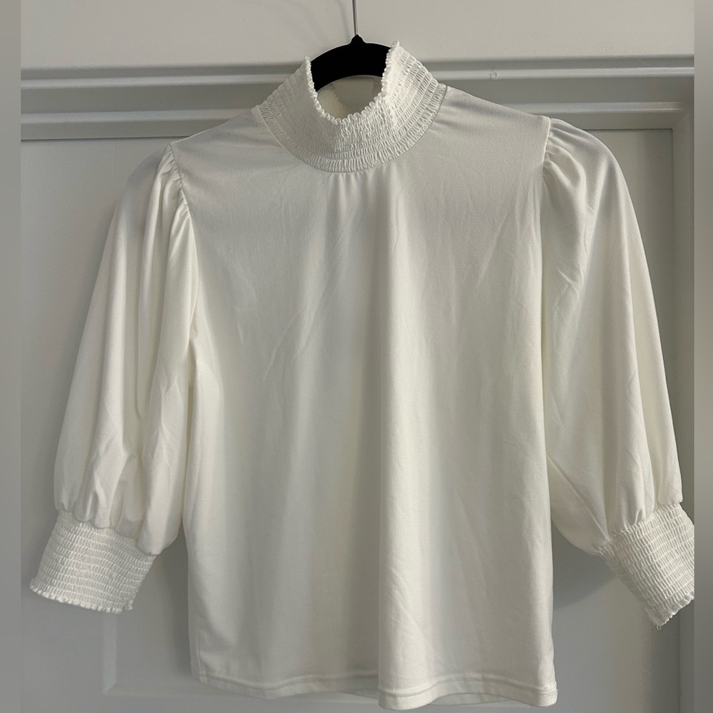 Brand new White 3/4 sleeve shirt